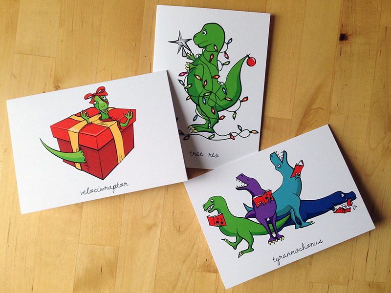 The dinosaur holiday cards arrive and are magnificent.