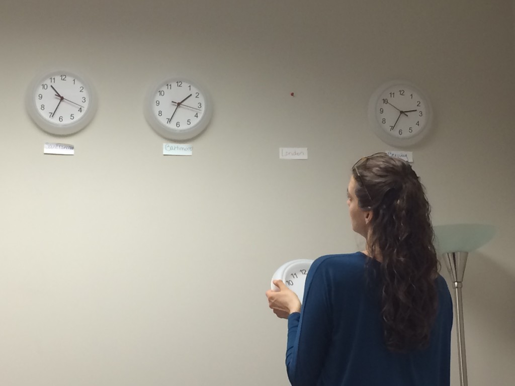 Stacy attempts to synchronize the second hands of every clock at work.